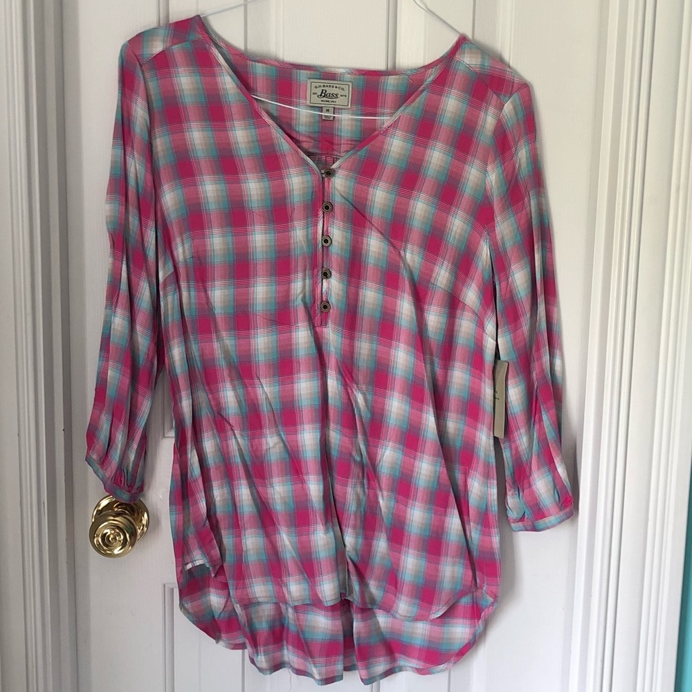 Pink, blue, tan, and white plaid shirt.